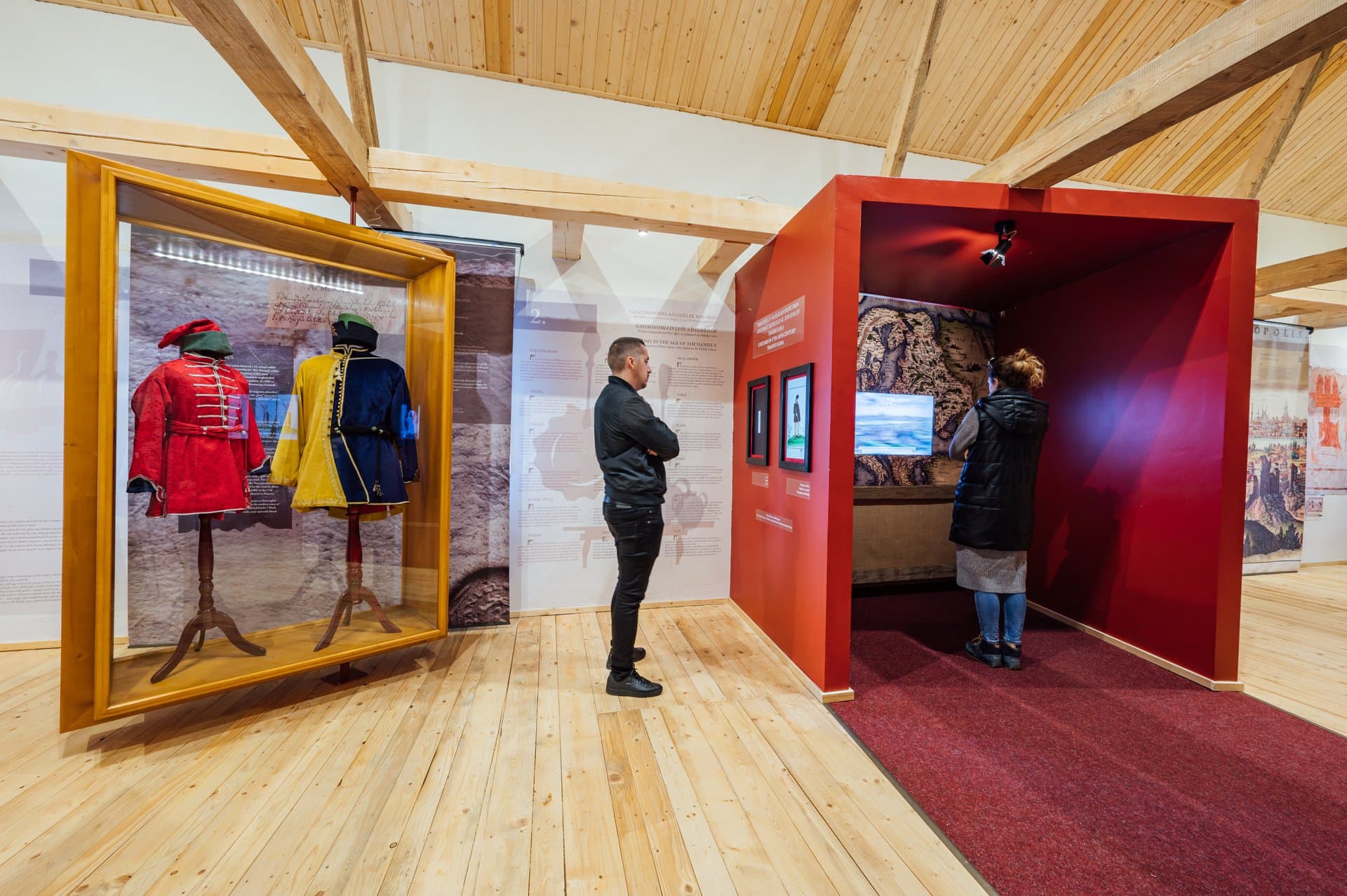 Visitors exploring the 1680 Reloaded multimedia exhibition